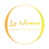 La Moment logo with yellow text on a dark gray background